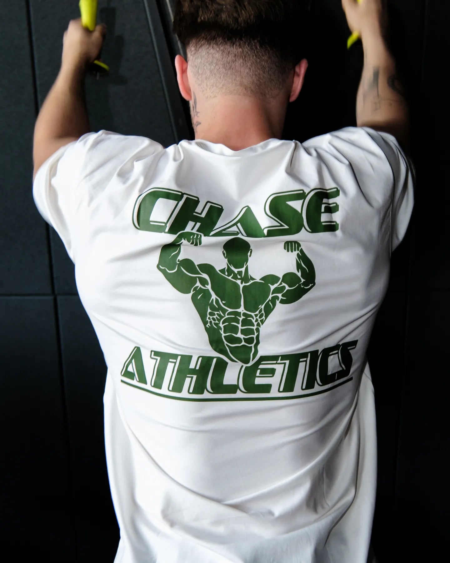 Oversized zwart lifting T-shirt voor heren van Chase Athletics – ideaal voor fitness en krachttraining.